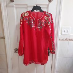 Johnny Was Red Floral Embroidered Tie Yoke Neck Georgette Tunic Top Blouse Size Small Like New Condition Rich Red Long Sleeve Top With Allover Multicolor Floral Embroidery Long Sleeve Boho Approximate Measurements Pit To Pit: 21" Top Of Shoulder To Bottom Hem: 30.5" Georgette Tunics, Red Long Sleeve Top, Embroidered Tie, Red Long Sleeve Tops, Red Long Sleeve, Johnny Was, Red Floral, Tunic Top, Floral Embroidery