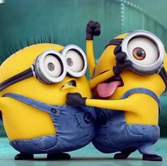 two minions from the movie despicable memes hugging each other's butts