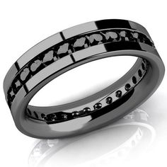 a wedding ring with black diamonds on it