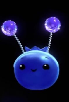 a blue object with two balls attached to it's head and three lights on top