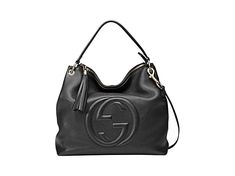 This black Gucci bag exudes luxury with its beautiful leather and gold-toned hardware. The famous interlocking GG logo is displayed proudly on the front. With a zipper pocket and two open pockets befitting of a phone, you'll have space to organize what you need to bring with you.     Model: 536194     Black Leather  Gold-tone Hardware  GG Soho  Top Zip Closure  Leather Shoulder Strap  Removable/Adjustable Shoulder Strap  Three Interior pockets  Strap Drop: 5"   Measurements: 13.5" x 5.5" x 13" ( Gucci Black Shoulder Bag With Zipper Closure, Gucci Shoulder Bag With Logo Hardware For Business, Black Gucci Shoulder Bag With Zipper Closure, Classic Gucci Bag With Zipper Closure, Modern Gucci Bags With Zipper Closure, Modern Gucci Bag With Branded Hardware, Gucci Leather Bag With Zipper Closure, Gucci Leather Shoulder Bag With Zipper Closure, Gucci Shoulder Bag With Zipper Closure For Everyday Use