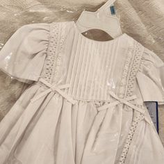 White, Long Length Christening Gown. Comes With Bonnet. For 12 To 16 Lbs, 6 To 9 Months. Never Worn/Used. Still With Tags. Baby Blessing Dress, Pink Toddler Dress, Modern Baby Girl, Sew Ideas, Plum Bridesmaid Dresses, Blessing Dress, Red Holiday Dress, Yellow Lace Dresses, Dots Dress