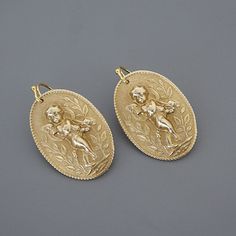 "Vintage Jewelry - Vintage Earrings - Angel Earrings - Brass jewelry - Cherub Earrings - Angel Jewelry - Chloe's Vintage handmade jewelry I love these earrings! Golden, sweet little Cherubs. Lovely Art Nouveau style. They hang from a gold plated French ear wire. Chloe says, \"Wear them and feel fabulous!\" They measure 1 1/4\" long\" from the top of the ear wire. Thanks for visiting Chloe's Brass naturally darkens. To shine it up simply use super soft steel wool and lightly buff." Brass Clip-on Earrings For Gift, Brass Clip-on Earrings As Gift, Cherub Earrings, Vintage Drop Earrings, Angel Earrings, Etsy Promotion, Earrings Golden, Angel Jewelry, French Jewelry