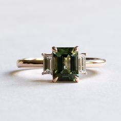 14k Green Tourmaline Diamond Ring – Rose & Choc Emerald Gemstone Engagement Ring Gold, Tourmaline And Diamond Ring, Green Engagement Ring And Wedding Band, Wedding Ring With Emerald Accents, Engagement Rings Emerald Cut Three Stone, Vintage Green Wedding Ring, Green Gem Rings, Green Emerald Cut Engagement Ring, Emerald Cut Gemstone Ring