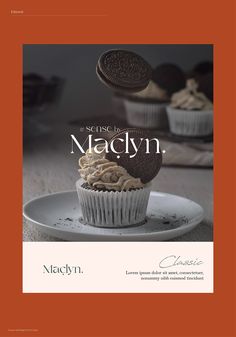 an advertisement for a chocolate cupcake with oreo cookies on top and the words macgyn above it