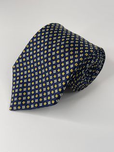 Blue and Gold. 100% Silk. Made in USA. Excellent condition. Navy Formal Ties For Summer, Blue Formal Neckwear For Spring, Blue Neckwear For Formal Spring Occasions, Blue Neckwear For Formal Occasions In Spring, Casual Standard Tie For Workwear, Casual Suit And Tie Accessories For Workwear, Casual Blue Ties For Workwear, Casual Blue Ties For Work, Casual Blue Ties For Spring