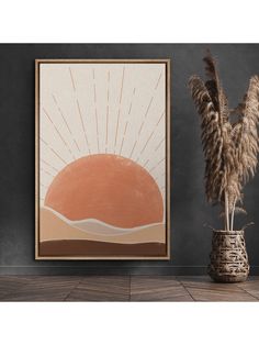 there is a plant in a vase next to a painting on the wall with an orange sun behind it