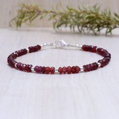 Deep Red Garnet Bracelet, Tiny Gemstones, Dainty Gemstone Stacking Bracelet, Sterling Silver or Gold Fill, January Birthstone This bracelet is very dainty - beads measure about 2-2.5mm apiece AAA Quality Please Feel Free To Contact If You Have Any Query. Orders are shipped within 1 business working day, excluding orders made on Sunday or national holidays. Domestic delivery takes 5-7 business days. International delivery takes 11-23 business days. PAYMENT METHOD : PayPal only Please send all payments within 7 days . Return policy: We are very confident on our fine jewelry will meet your expectations, your satisfaction is our priority. However, if for any reason you are not satisfied with our product, you may return your order within 14 days from the date of shipment. The item must be retur Garnet Bracelet, January Birthstone, National Holidays, Bracelet Sterling Silver, Red Garnet, Bracelet Stack, Deep Red, Handcrafted Jewelry, Garnet