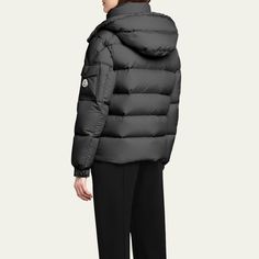 Moncler "Maya 70" puffer jacket crafted from matte nylon laqué with iconic boudin quilting  Detachable hood with snap buttons; adjustable drawstring fastening Stand collar; two-way zipper/snap closure Long sleeves; adjustable, elasticized cuffs with snap buttons Flap pocket with logo patch at left sleeve Zipped external and internal pockets Hem with drawstring fastening  Polyester Lining: Nylon Fill: Down/Feather Hand wash Imported Designer Hooded Puffer Jacket With Padded Collar, Luxury Down Puffer Jacket With Detachable Hood, Designer Winter Puffer Jacket With Detachable Hood, Designer Quilted Down Puffer Jacket, Luxury Hooded Puffer Jacket With Zipper Closure, Designer Quilted Hooded Puffer Jacket, Designer Down Puffer Jacket With Detachable Hood, Luxury Nylon Outerwear With Detachable Hood, Luxury Hooded Down Puffer Jacket