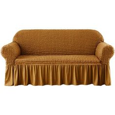 a couch covered in a brown cover with pleated skirting on the top and bottom