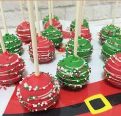 Holiday cake pops * 1 dozen  chocolate and vanilla flavored cakes, dipped in white chocolate flavored red and green chocolates, decorated with white chocolate drizzle and holiday sprinkles  *Can substitute cake flavors, leave desired cake flavors in notes at check out. *Individually wrapped  *Contains: wheat, milk, egg Red And Green Cake, Holiday Cake Pops, Flavored Cakes, Reindeer Hot Chocolate, Grinch Cake, Cookie Brownies, White Chocolate Drizzle, Christmas Themed Cake