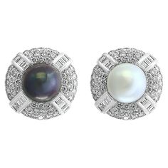 South Sea Pearl Day & Night with 12 Carats Diamond Cocktail Earrings 18 K White Gold , Beautiful estate piece one South Sea white Pearl and one Tahitian black Pearl both pearls are absolutely clean with no blemishes . Pearls are surrounded by 12 Carats of Diamonds of High quality perfect pair made in 18 Karat White gold Gold 36 Grams Diamonds: approximate 12 ct Earring are Clip earrings but we can add a post too . All our jewelry comes with a certificate appraisal and money back guaranteed. Plea 1st Dibs Earring, Luxury Round Pearl Earrings For Evening, Cocktail Earrings, Tahitian Black Pearls, Sea Pearl, South Seas, South Sea Pearls, Sea Pearls, Day Night