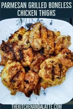 grilled chicken thighs on a white plate with text overlay