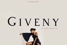 a woman in a black dress is posing for the cover of a magazine called giveny