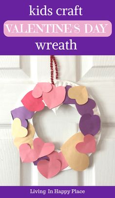 a paper heart wreath hanging on a door with the words easy toddler valentine's wreath