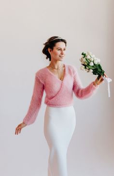 "Mohair Cardigan Bridal Sweater . Mohair jacket will allow you to keep warm in winter at a wedding and festive event, and at the same time look truly beautiful and luxurious. The cardigan has a semi - fitted silhouette , the length reaches the waist . As a fastener, the cardigan has two long ties that you can tie beautifully at the back. Cardigan made of blend mohair wool yarn. In the photo color - 32 - pink. Model height 175 cm / 68.90 \" and is wearing size M. The model in the photo has a bole Elegant Pink Winter Cardigan, Elegant Fall Wedding Cardigan, Elegant Pink Cardigan For Party, Elegant Wedding Sweater For Winter, Elegant Winter Wedding Cardigan, Elegant Pink Party Cardigan, Elegant Mohair Sweater For Winter, Elegant Mohair Winter Sweater, Winter Wedding Mohair Sweater