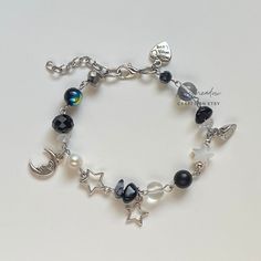 "A sweet handmade bracelet, part of my 'Paired Up' Collection ✿ Made with freshwater pearls, Quartz, mother of Pearl, glass, glass crystal, and metal accents ✿ My Moon: Pearlescent white, iridescent clear, clear, milky white, oil slick shade, grey, black, matte black, clear navy, and silver ✿ Paired with the My Stars bracelet, also available on my shop ✿ The bracelets have an additional 1-1.5\" of extension chain Additional Options ✿ Choose your favorite pair to share with a friend, family, a lo Moon Bracelet Aesthetic, Acubi Bracelet, Moon Bead Bracelet, Silver Metal Bracelets With Moon Charm, Adjustable Moon Charm Bracelet, Mother Of Pearl Bracelet, Diy Jewelry Rings, Moon Bracelet, Fancy Beads