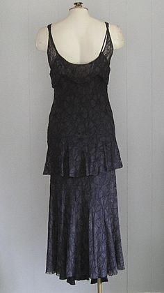 APPROXIMATE MEASUREMENTS (INCHES): Current Size: XS/S Bust: 32/34 Waist: 28/30 Hip: 34/36 Length (shoulder to hem): 51 CONDITION Excellent vintage condition DESCRIPTION 1930s bias cut dress 2-piece black lace with matching slip Side snap closure 1920s Fitted Flapper Dress For Formal Occasions, Fitted Art Deco Dress For Gala, Vintage Fitted Maxi Dress For Gala, 1920s Style Fitted Flapper Evening Dress, Silk Gatsby Style Fitted Flapper Dress, Elegant Fitted Floor-length Flapper Dress, Black Lace Bias Cut Dress, Black Lace Bias Cut Slip Dress, Vintage Silk Flapper Dress Fitted