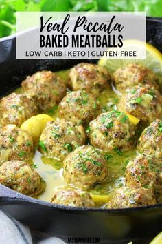 meatballs are cooked in a skillet with lemon wedges and parsley on the side