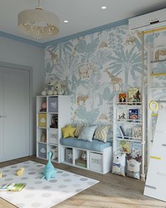 a child's room with blue and white wallpaper, bookshelves, toy storage units and toys on the floor