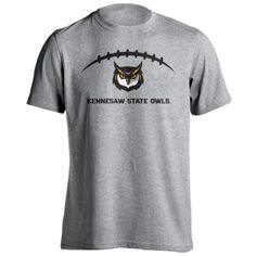 Kennesaw State University KSU Owls Laces Out Football Logo Short Sleeve T-Shirt Show your Owls pride by wearing this Kennesaw State University Laces Out Football t-shirt! This classic style tee shirt will quickly become your go-to shirt all year round. This tee is perfect for any Alumni or Student of KSU and wants everyone to know they are a fan of the Kennesaw State University Football Team! Sport Your Gear original design High Quality Printed Graphic on front in the official Owl colors Rib col Kennesaw State University, Kennesaw State, Football T Shirt, Football Logo, Football Team, State University, Fashion Tees, Owls, Original Design