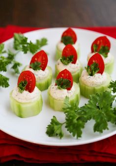 cucumbers with tomatoes and parsley on a white plate, ready to be eaten