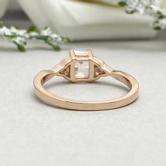 This beautiful ring is made from Solid 14K Rose Gold Or Genuine 925 sterling silver with rhodium plating. Ring details- -The Main stone is an Emerald Cut 7mm by 5mm Simulated Diamond -No Side Stones -Ring is casted in solid 14K Rose Gold Or 925 sterling silver with rhodium plating (yellow gold and rose gold also available, please check the drop down menu for more options) -The Total face height of the ring measures 7.5mms and the band width measures 2mms -Each ring is handmade and made to order, Garnet Wedding Rings, Celtic Engagement Rings, Celtic Ring, Wedding Rings Round, Celtic Rings, Etsy Wedding Rings, Beautiful Ring, March Birth Stone, Ring Collections