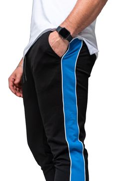 Athleisure is reinvented in these comfy joggers that leave others in the dust with supersoft fleece, bold side stripes and a skinny fit. Elastic/drawstring waist Front scoop pockets 92% cotton, 8% elastane Hand wash, dry flat Made in Turkey Stretch Sweatpants With Side Stripes For Jogging, Stretch Joggers With Side Stripes For Jogging, Athleisure Joggers With Side Stripes For Loungewear, Cotton Sweatpants With Side Stripes For Jogging, Casual Sweatpants With Contrast Stripes For Sports, Athleisure Sweatpants With Side Stripes For Jogging, Relaxed Fit Joggers With Side Stripes For Jogging, Sporty Black Sweatpants With Contrast Stripes, Sporty Joggers With Ribbed Waistband For Jogging