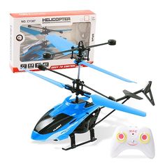 a toy helicopter with remote control in the box