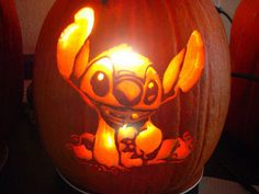 a carved pumpkin with an image of stitcher on it