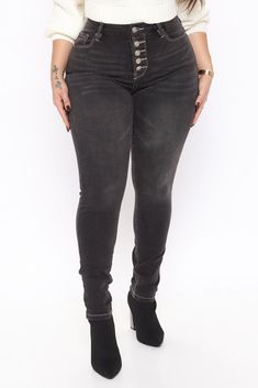 Available In Black. Ankle Skinny Jean Contrast Stitching Stretch Denim 28.5" Inseam 10.5" High Rise 5 Exposed Button Closure Disclaimer: Due To The Specialized Wash Process. Each Garment Is Unique. 53% Cotton 21.2% Polyester 24% Rayon 1.8% Spandex Imported High Rise Black Jeans With Buttons, Black Denim Bottoms With Snap Buttons, High Rise Black Jeans With Button Closure, Mid-rise Black Jeans With Buttons, Black High Rise Jeans With Button Closure, Black High-rise Jeans With Button Closure, Black Mid-rise Jeans With Buttons, High Rise Washed Black Bottoms With Button Closure, Mid-rise Washed Black Bottoms With Button Closure