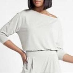 Express Silky Sueded Jersey Off The Shoulder Tee Available Sizes: Large & Xl Color: Silver Heather Gray Brand New With Tags Product Details Description Sleek Enough To Wear Out, Comfy Enough To Lounge In, This Off-The-Shoulder Version Of Our Tee Will Be Your New Casual Go-To. Wear It Everywhere. Now In Our Softest, Most Comfy Silky Sueded Jersey Fabric. Features & Fabric Off The Shoulder Neckline Three Quarter Length Sleeves Straight Hem Modal/Polyester Casual 3/4 Sleeve Loungewear Tops, Chic White Top With 3/4 Sleeves, Chic White 3/4 Sleeve Top, Solid Color Tops With 3/4 Sleeve For Day Out, White Stretch Top With 3/4 Sleeve, White Relaxed Fit Top With 3/4 Sleeves, Off The Shoulder Tee, Heather Gray, Jersey Fabric