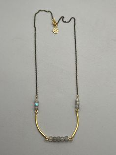 19" necklace with brass findings and labradorite. Gold Labradorite Everyday Jewelry, Everyday Gold Labradorite Jewelry, Adjustable Brass Wire Wrapped Necklaces, Elegant Labradorite Necklace With Adjustable Chain, Gold Moonstone Necklace With Adjustable Chain, Adjustable Nickel-free Labradorite Necklaces, Adjustable Nickel Free Labradorite Necklaces, Nickel-free Long Brass Necklace, Adjustable Wire Wrapped Labradorite Necklaces