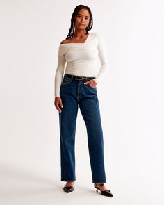 Elevate your denim collection with the Abercrombie & Fitch Women's Curve Love High Rise Vintage Straight Jean in a sophisticated dark wash. Perfectly tailored to flatter your curves, these jeans are a must-have for those who appreciate both style and comfort.

- Size: 26 LONG
- Color: Dark
- Material: Cotton, Elastane
- Gender: Female
- Fit: High rise, 10.5” rise; relaxed at the waist and hips; straight-leg shape
- Features: Curve Love fit to reduce waist gap, vintage stretch fabric for comfort Vintage Straight Jeans, Dark Material, Love Vintage, Denim Collection, Extra Room, Suits Coats, Pocket Bag, Athletic Fits, New Arrival Dress