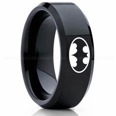 an image of batman symbol black ceramic ring