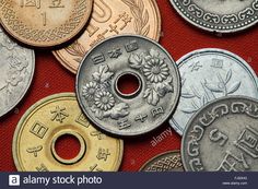 an assortment of foreign coins on a red background with chinese characters and symbols around them