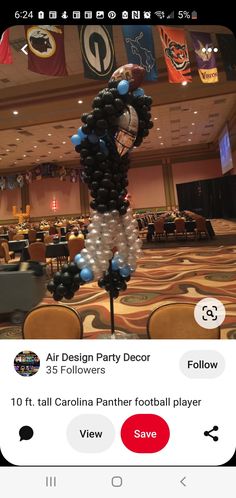 an air balloon decoration in the middle of a room