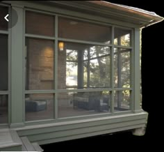 an image of a screened in porch with glass doors on the front and back sides