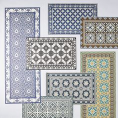 four different rugs are shown in various colors and patterns, each with an intricate design