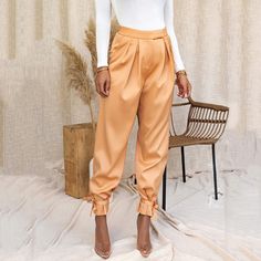 Bow Tie Pants Show your unique style with these Bow Tie Pants! These high-waisted dress pants have a twist, the statement making bow-tie at the hem. Making them perfect for any occasion. Be ready for the compliments! 💁‍♀️ Bow Tie Pants, High Waisted Dress Pants, Satin Pants, Type Of Pants, High Waisted Trousers, Wholesale Fashion, Long Pants, High Waisted Pants