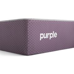 the purple mattress is made from foam and has white lettering on it that reads,'purple