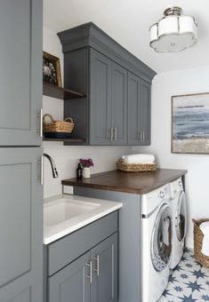 a washer and dryer in a small room