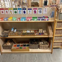 the shelves are filled with different kinds of cards and supplies for sale in this store