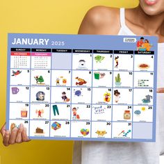 a woman holding up a calendar for the month of january in front of a yellow background