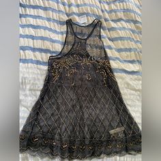 Free People Extra Small Sheer Beaded Dress Embellished Sleeveless Mini Dress For Festival, Black Sequin Festival Dress, Black Sequined Dresses For Festivals, Black Sequined Dress For Festival, Elegant Beaded Festival Dress, Elegant Beaded Dresses For Festival, Summer Black Embellished Mini Dress, Black Sleeveless Embellished Sequin Dress, Spring Black Embellished Sequin Dress