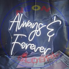 there is a neon sign that says always be forever