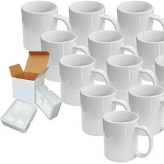 there are many white coffee mugs with one open box on the bottom and six empty ones in the middle