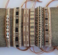 a bunch of bracelets that are sitting on a table