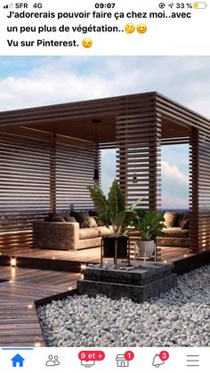 an outdoor living area with wooden slatted walls and seating on the decking