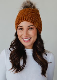 Rust knit pom hat Natural faux fur pom accent Fleece lined Crown patch on the left side One size 100% Acrylic Pairs with matching mittens Maureen Mittens Fun Hat, Knitted Hats Kids, Knit Hat For Men, Knit Jewelry, Layered Rings, Blouse Tank Top, Dangle Necklaces, Knit Mittens, Knitting For Kids